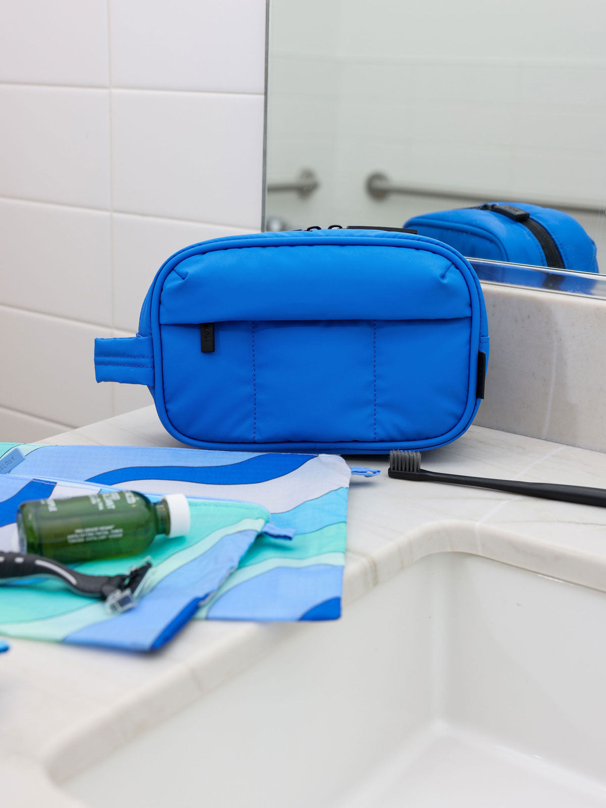 blue soft quilted toiletry bag