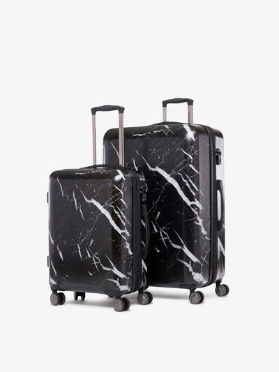 2 piece CALPAK Astyll black marble luggage set that includes a carry on and large suitcase; LAT2000-MIDNIGHT-MARBLE view 1