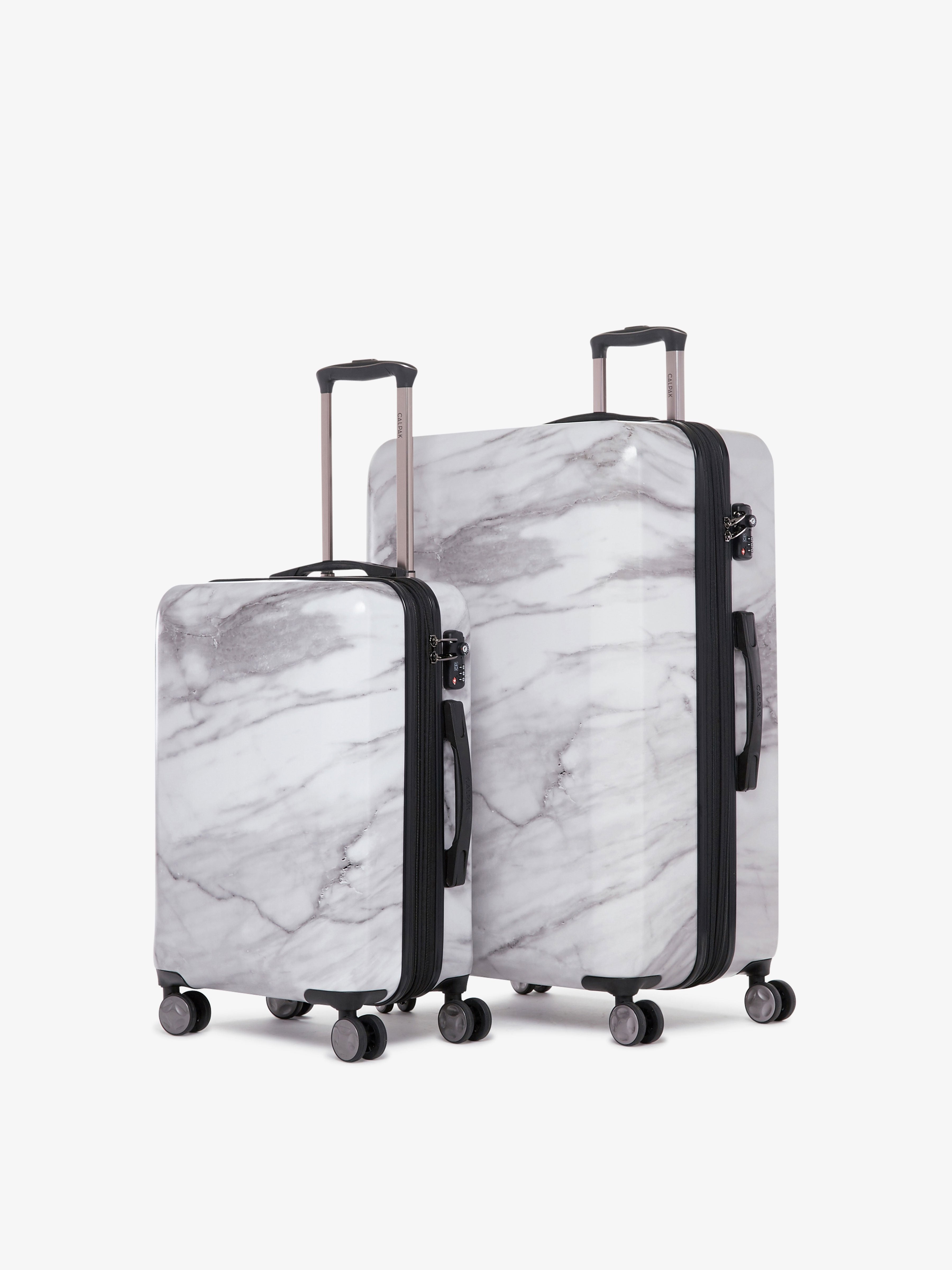 2 piece CALPAK Astyll white marble luggage set that includes carry on and large suitcase; LAT2000-MILK-MARBLE