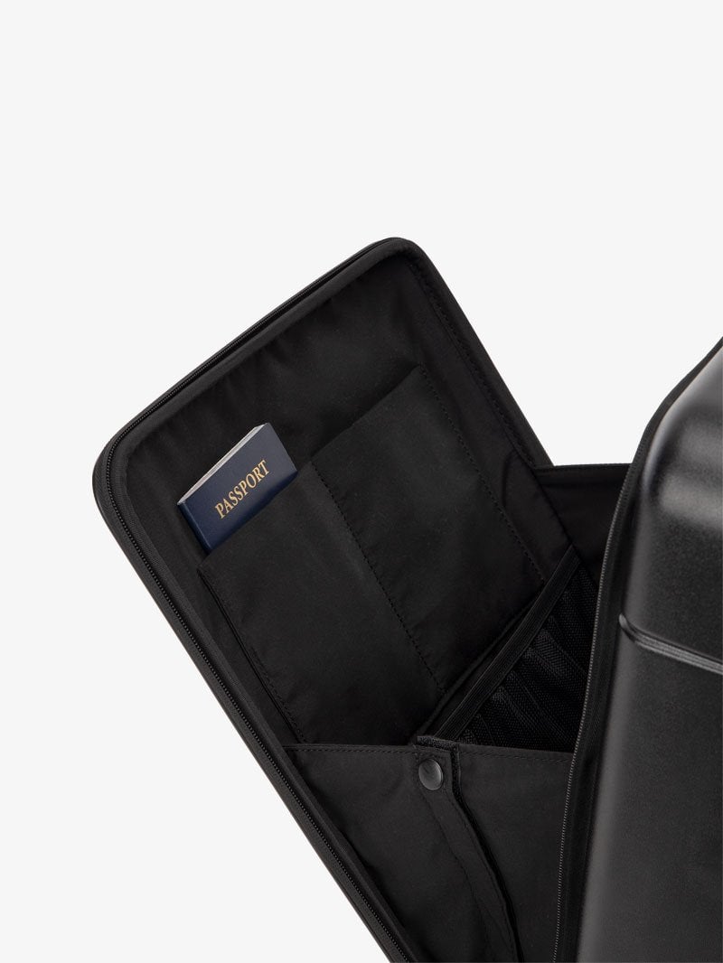 the laptop compartment of CALPAK Hue carry-on suitcase in black color