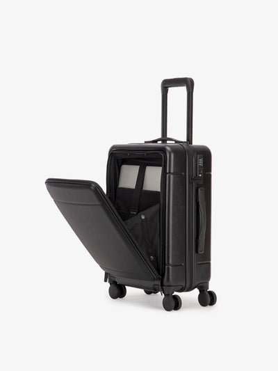 black CALPAK Hue hard shell carry-on spinner luggage with laptop compartment; LHU1020-BLACK