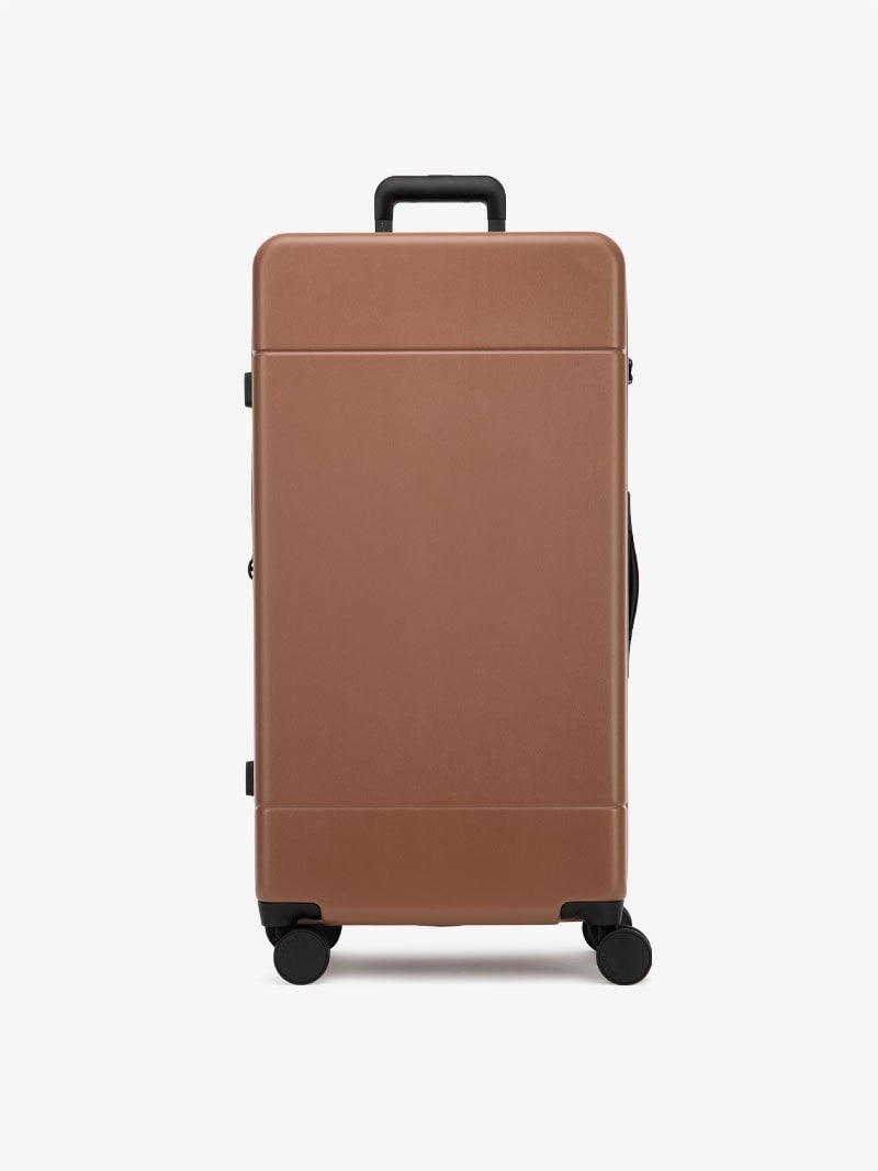 CALPAK Hue 31 inch hardside polycarbonate trunk luggage in brown hazel color