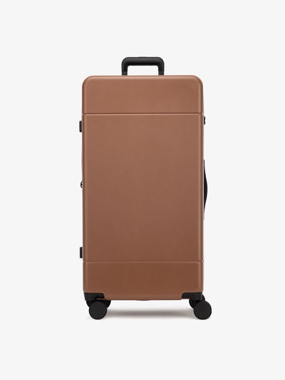 CALPAK Hue 31 inch hardside polycarbonate trunk luggage in brown hazel color; LHU1030-HAZEL