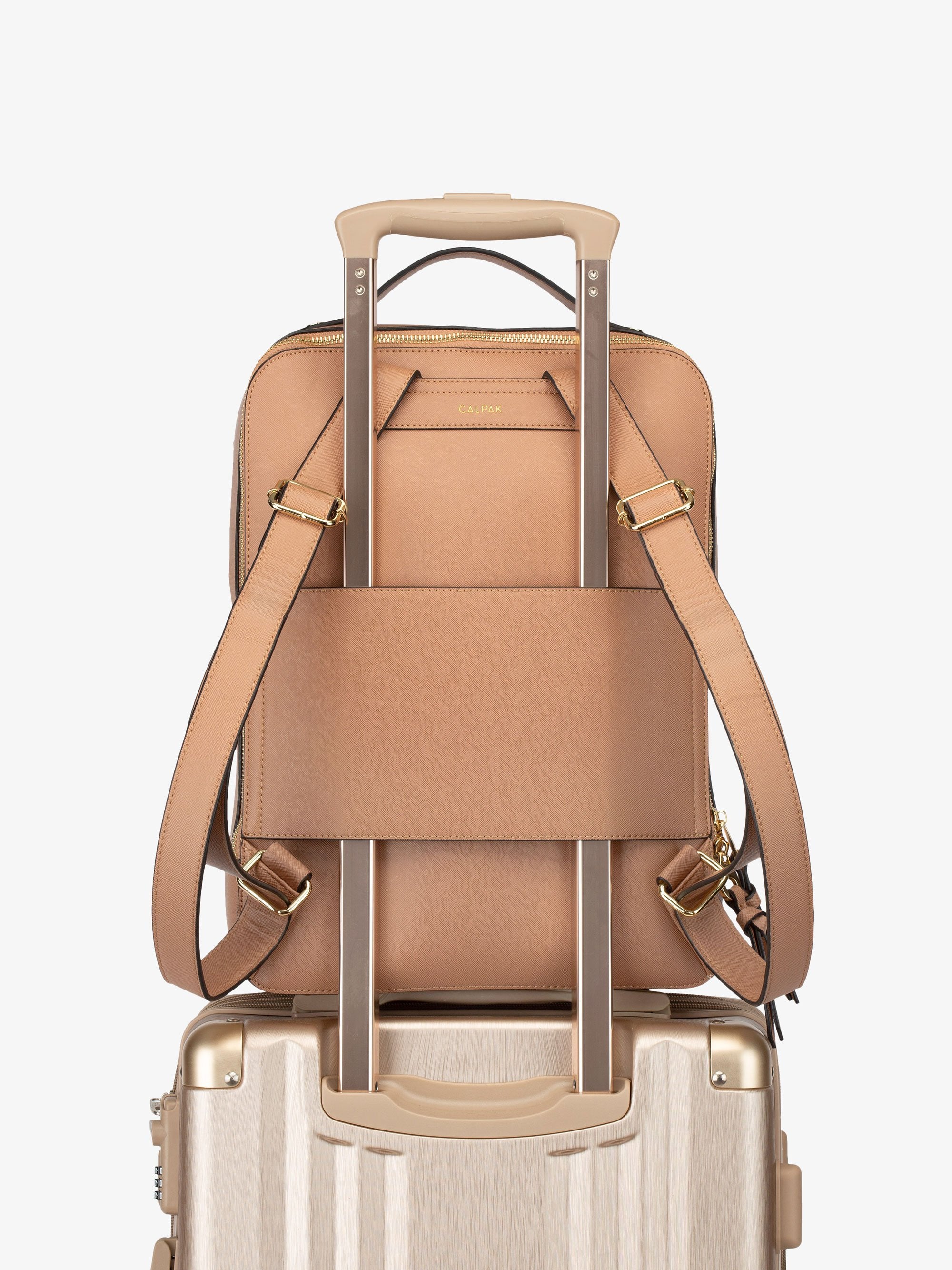 caramel brown CALPAK Kaya laptop backpack for women with luggage trolley sleeve