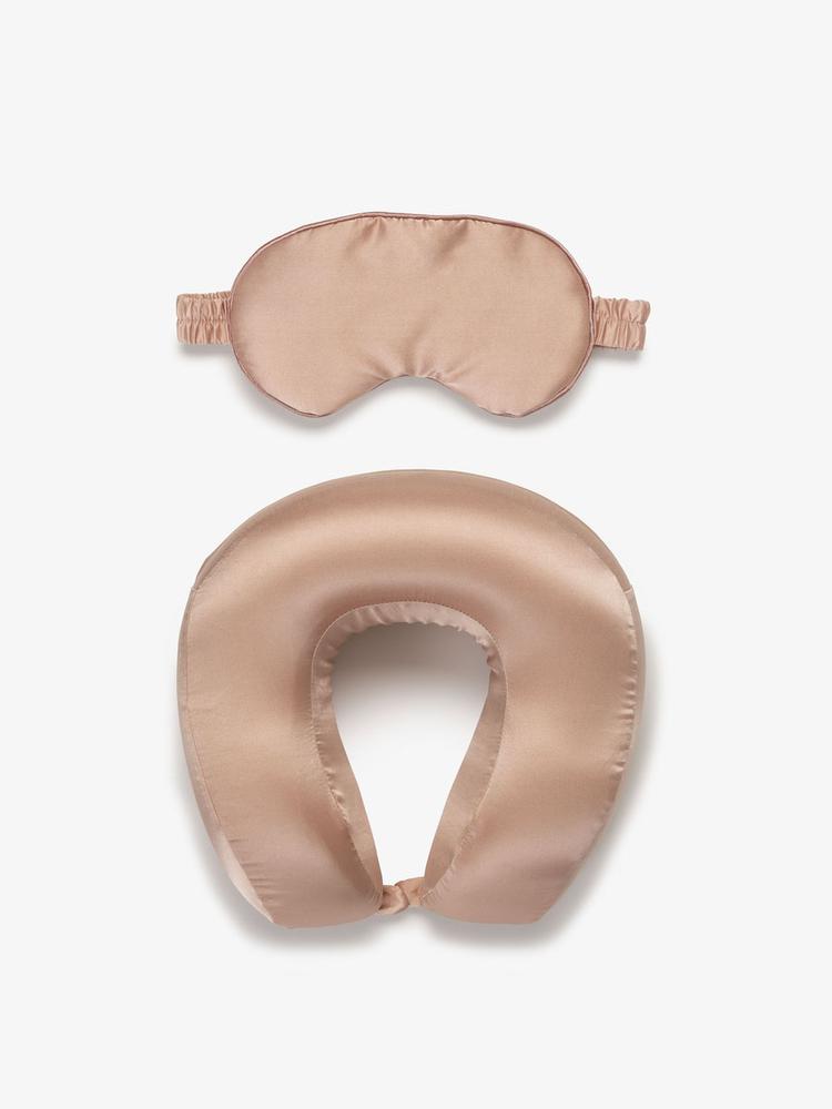 Rose gold travel pillow and eye mask in luxurious silk