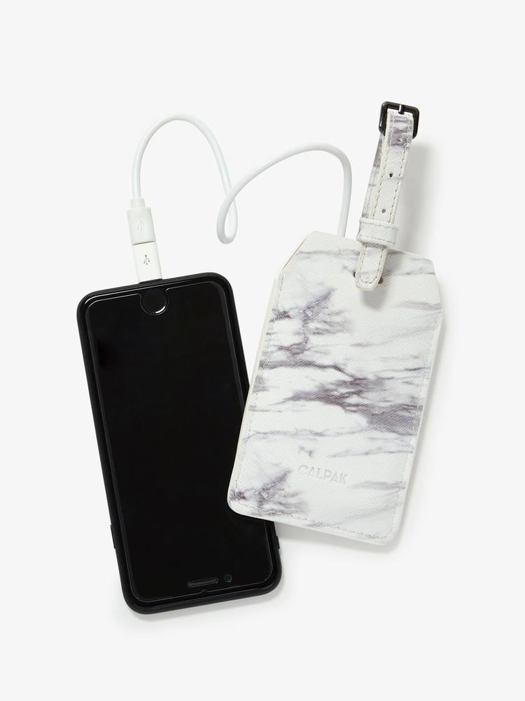 stylish fashion CALPAK power luggage tag in white marble color with travel battery inside