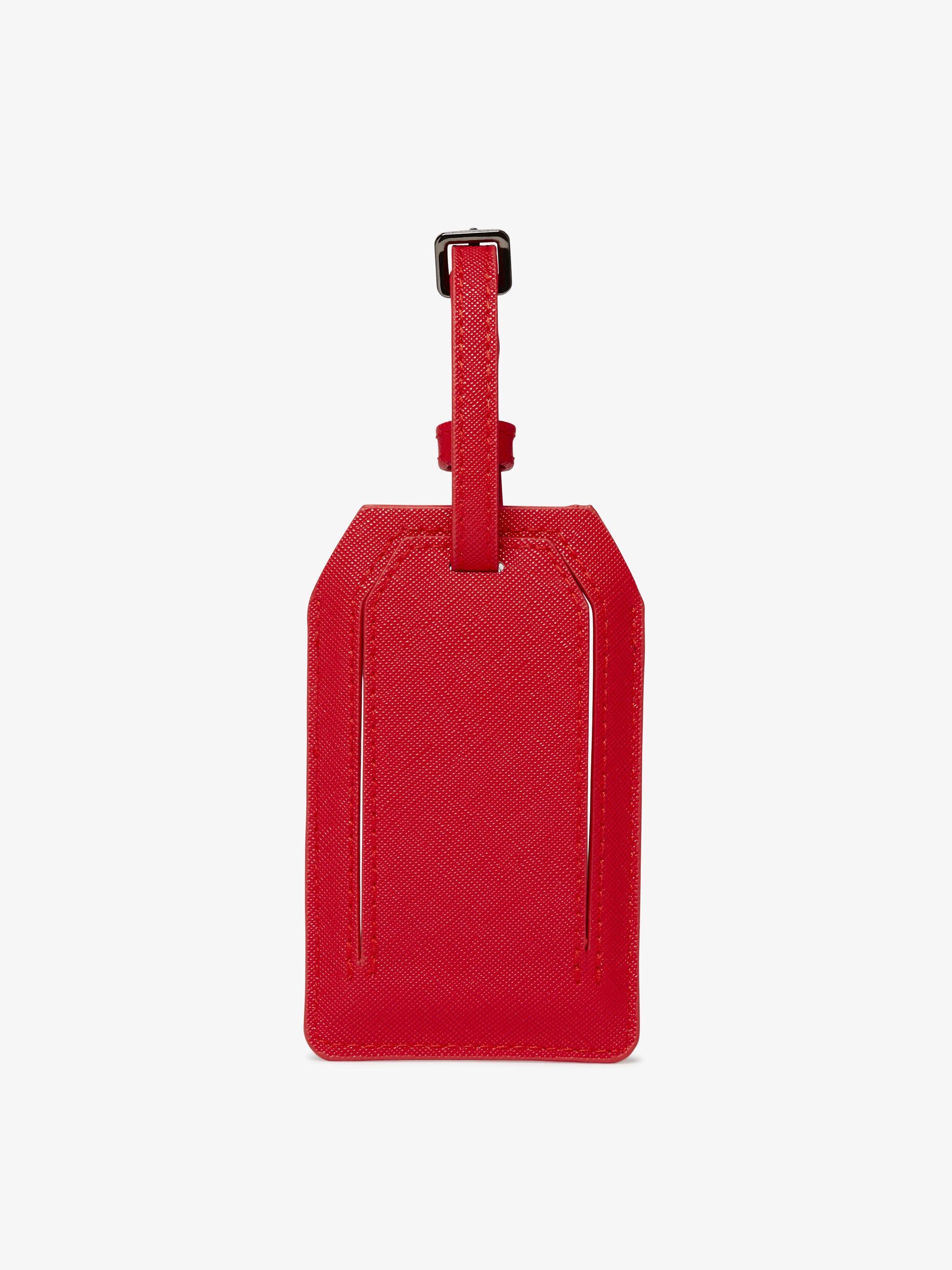 red luggage tag with charger inside